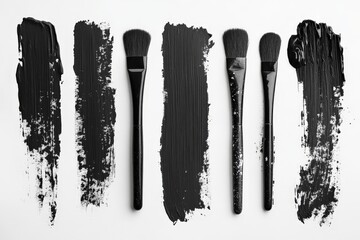 Poster - Various makeup brushes with black cream stroke art arranged on a light background for professional beauty application techniques