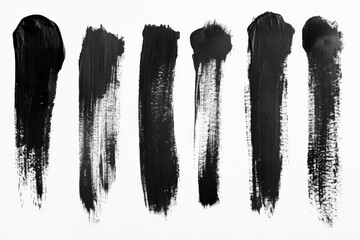Poster - Black paint strokes on a white canvas showcasing different textures and lengths in an artistic arrangement
