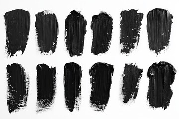 Poster - Various textures and strokes of black paint arranged in an artistic layout on a white background