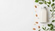© mangolovemom - A glass bottle of milk surrounded by almonds and green leaves, showcasing a fresh and natural dairy product aesthetic.