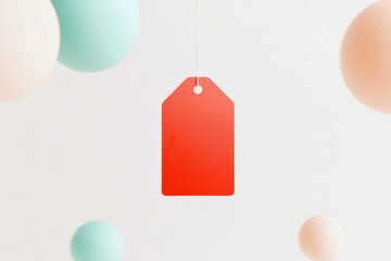 Poster - Hanging red tag surrounded by colorful spheres in a bright, minimalistic environment