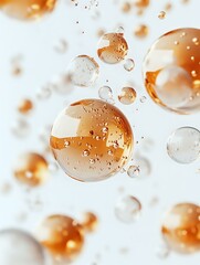 Poster - Floating golden spheres with water droplets on white background, abstract macro photography with selective focus and bokeh effect for cosmetic product design.