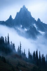 Wall Mural - Majestic Mountain Peak Shrouded in Morning Mist