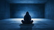 © Nadiyah - Person meditating in a dark, concrete room.  Possible use website banner or album art