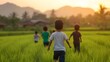© pkproject - Carefree Children Playing in Lush Rural Rice Field at Sunset