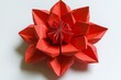 © Eakkarin - Lotus flower origami on white. Beautiful and simple model, folded red paper. Handmade ornaments, DIY, children's art. , isolated on white background,  , copy space for text,