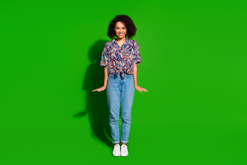 Wall Mural - Full body photo of attractive young woman girlish sweet posing dressed stylish colorful clothes isolated on green color background