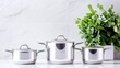 © BROPRADANA - Stainless steel cookware set in kitchen