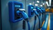© izzuddin - Electric vehicle charging station with multiple connectors in a modern facility, showcasing technology