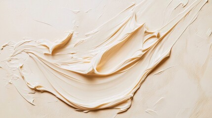 Poster - Soft, creamy substance glides across a light-colored surface, showcasing delicate whirls and folds. The play of light emphasizes its rich texture and warmth