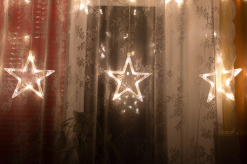 Wall Mural - Decorative stars on window in the room
