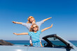 © Sunny studio - Happy family travel by car by the sea
