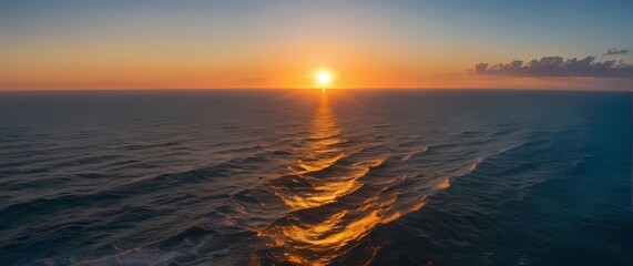 Wall Mural - Breathtaking panoramic view of the ocean meeting the sky during sunset