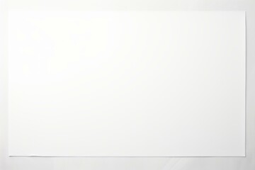 Poster - Clean white paper sheet laying on white background provides simple yet effective minimalist backdrop
