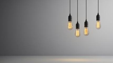 Wall Mural - Four Vintage Light Bulbs Hanging in a Minimalist Interior Space with Soft Lighting on Grey Background