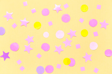 Wall Mural - Composition with confetti and stars on yellow background