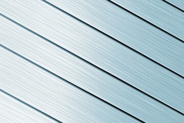 Poster - Smooth metallic surface with diagonal lines showcasing texture and light reflection in a modern setting