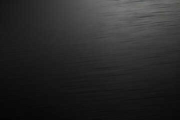 Poster - Subtle textures of a dark metallic surface reflecting light in an artistic display