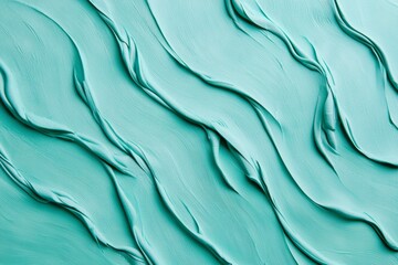 Poster - Turquoise cosmetic cream creating a wavy pattern forms a soothing texture, perfect for beauty and wellness concepts, enhancing the appeal of skincare products in any setting