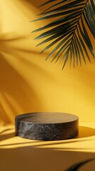 Poster - Empty black marble podium on yellow background with palm leaf and shadow creating a summery and tropical atmosphere for product presentation