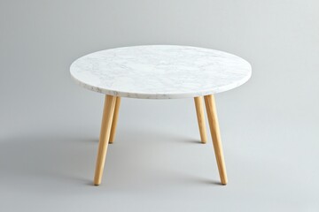 Poster - Minimalist round coffee table featuring a smooth white marble top and elegantly tapered wooden legs, set against a neutral grey backdrop, creating a stylish and contemporary furniture piece