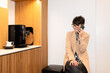 © Alvaro Lavin/Stocksy - Businesswoman making a phone call during break time in coworking space