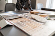 © Alvaro Lavin/Stocksy - Architect choosing material samples for interior design project