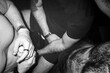 © Luciano Spinelli/Stocksy - Close-Up of Male Arms and Hands in Nightlife Setting