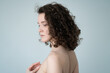 © Igor - portrait of young beautiful woman with curly hair in studio