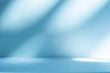 Fototapete - Wall interior background, studio and backdrops show products. with soft light shadow from window color blue and white. background for text insertion and presentation of product	