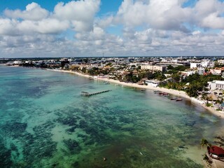 Wall Mural - Aerial view of Cancun's coastal cityscape.