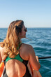 © svetograph - Kayaking Woman Ocean View - Relaxing kayaking experience on the ocean with beautiful views.