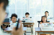 © DG PhotoStock - Group of diverse children enjoy learning about the STEM.