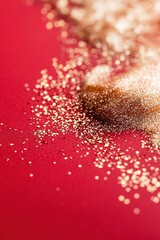 Poster - A rich red gradient serves as the backdrop, with fine gold glitter particles concentrated around the edges, enhancing the center with a smooth and elegant finish, perfect for festive occasions