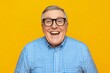 © Tomson - Smiling mature man in glasses posing for portrait in studio - Adobe Stock Optimized Title