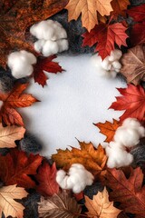 Sticker - Autumn leaves and cotton balls creating copy space on white background