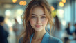 © Ari - Japanese businesswoman wearing blue smart-casual smiling at office activity