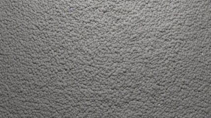 Poster - Gray Granular Texture of a Grainy Surface with a Smooth Appearance and Even Distribution of Particles for Background or Abstract Use