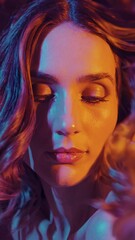Leinwandbilder - a moody close-up of a woman’s face, framed by swirling orange and purple tones.