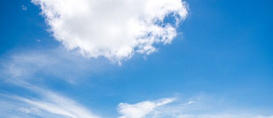 Wall Mural - clear blue sky background,clouds with background, blue sky background with tiny clouds. white fluffy
