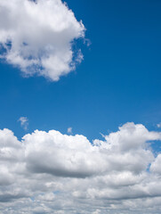 Wall Mural - clear blue sky background,clouds with background, Blue sky background with tiny clouds. White fluffy clouds in the blue sky. 