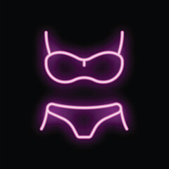 Poster - pink neon sign representing a bikini, glowing on a black background