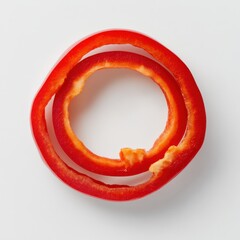 Poster - Sliced vibrant red pepper rings displayed on a white background for culinary inspiration and freshness