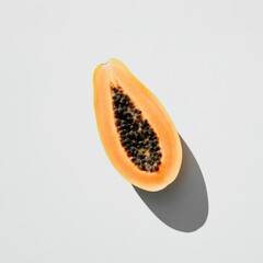 Poster - Vibrant orange ripe papaya slice showcasing its rich texture and seeds against a light background for culinary inspiration