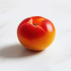 Poster - Ripe nectarine with smooth orange skin and faint red blush on a pristine white surface