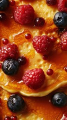 Poster - Delightful close-up of fluffy pancakes topped with fresh berries and golden syrup