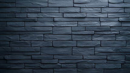 Poster - A close-up view of a textured dark stone wall, showcasing the craftsmanship and design in an urban setting. Ideal for architectural themes, modern decor, or minimalist backgrounds.