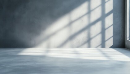 Poster - A minimalistic room bathed in natural light, featuring a clean concrete floor and shadow patterns created by grid-like windows. Perfect for modern interior design themes.