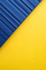 Poster - abstract image featuring a diagonal split between deep blue textured surface and vibrant yellow back