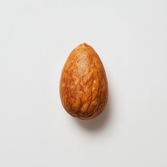 Poster - Single roasted almond on a white background showcasing its golden brown texture and shape